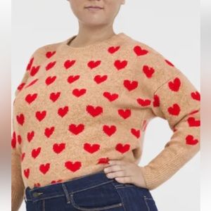 - Vince Camuto, ladies Heart sweater size large measures tan and reds